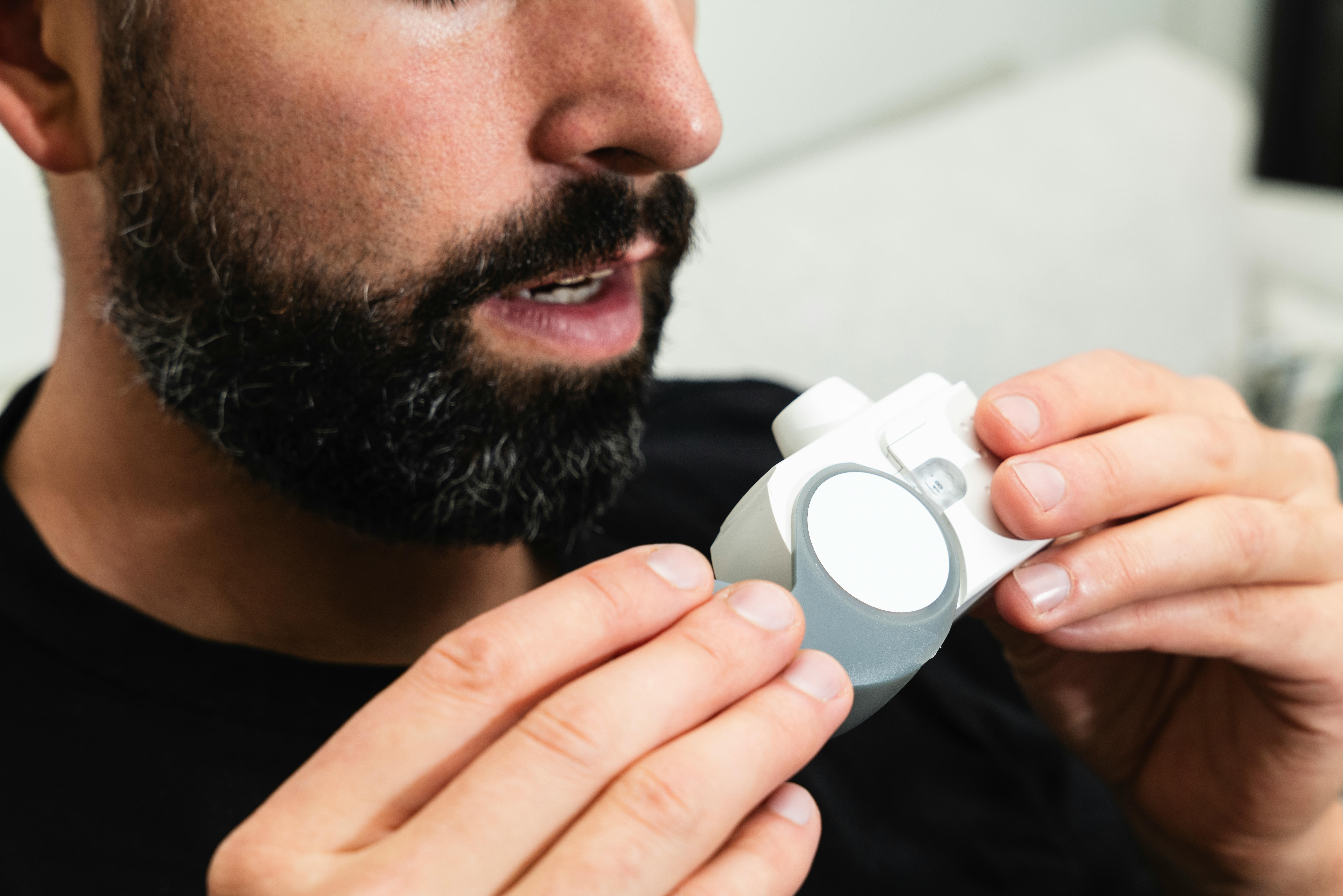 Person using breathing test device